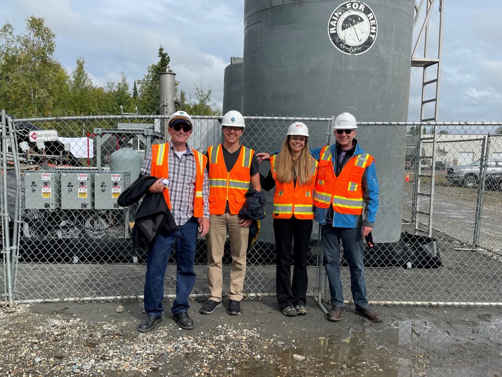 David Fleming, far right, poses during TRS Group's demonstration day at