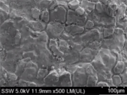 Microscopy image of PFAS-laden crusty deposit on a surface (Arcadis, 2021)