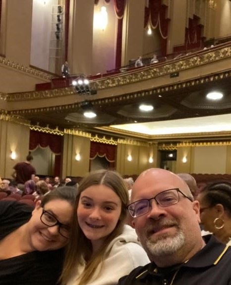 Michelle e sua família assistem a um show no Stifel Theatre em St.