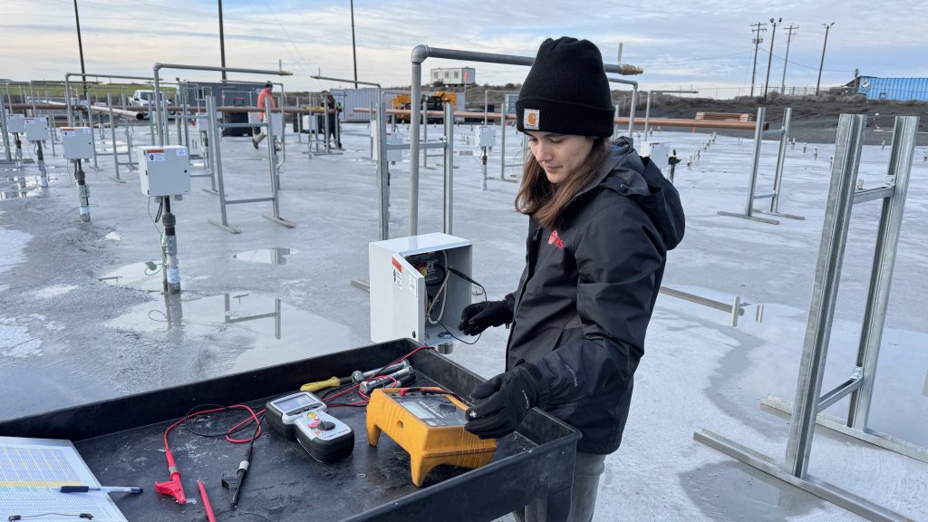 Erica Seiler, Staff Engineer, tests a heater at a site in Washington state.