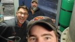 Bob Glass takes a selfie with some TRS coworkers.